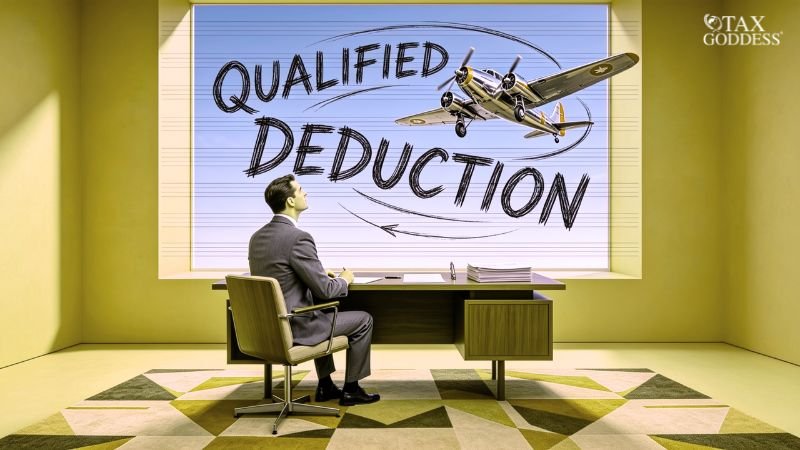 An illustration of a businessman sitting at his office desk, looking out a large window at a twin-engine propeller airplane flying through the sky. Handwritten text overlay reads "QUALIFIED DEDUCTION" with circular arrows tracking around the plane. The Tax Goddess logo is in the top right corner.